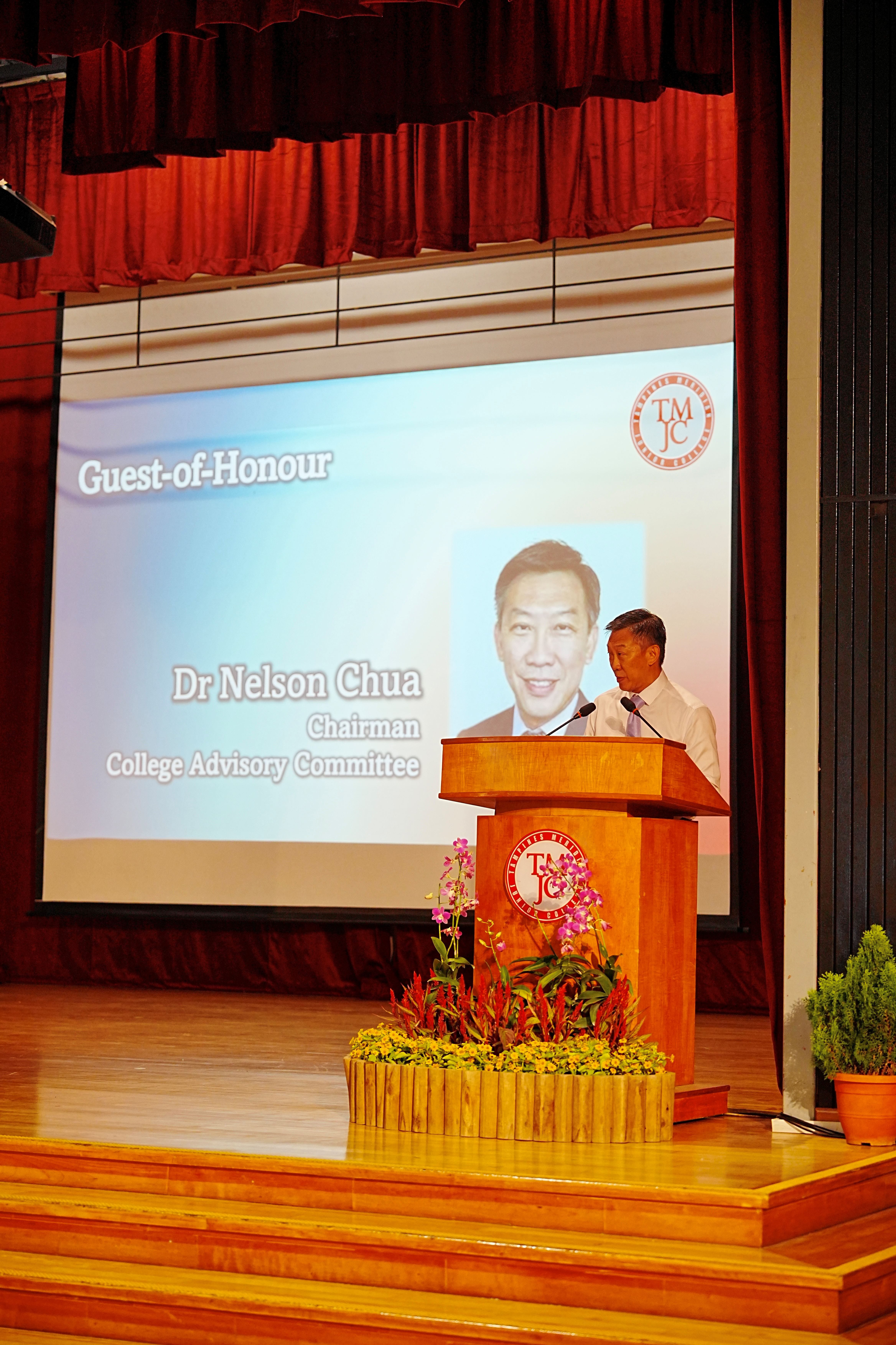 Guest-of-Honour Dr Nelson Chua, Chairman of the College Advisory Committee, speaking at the TMJC podium.